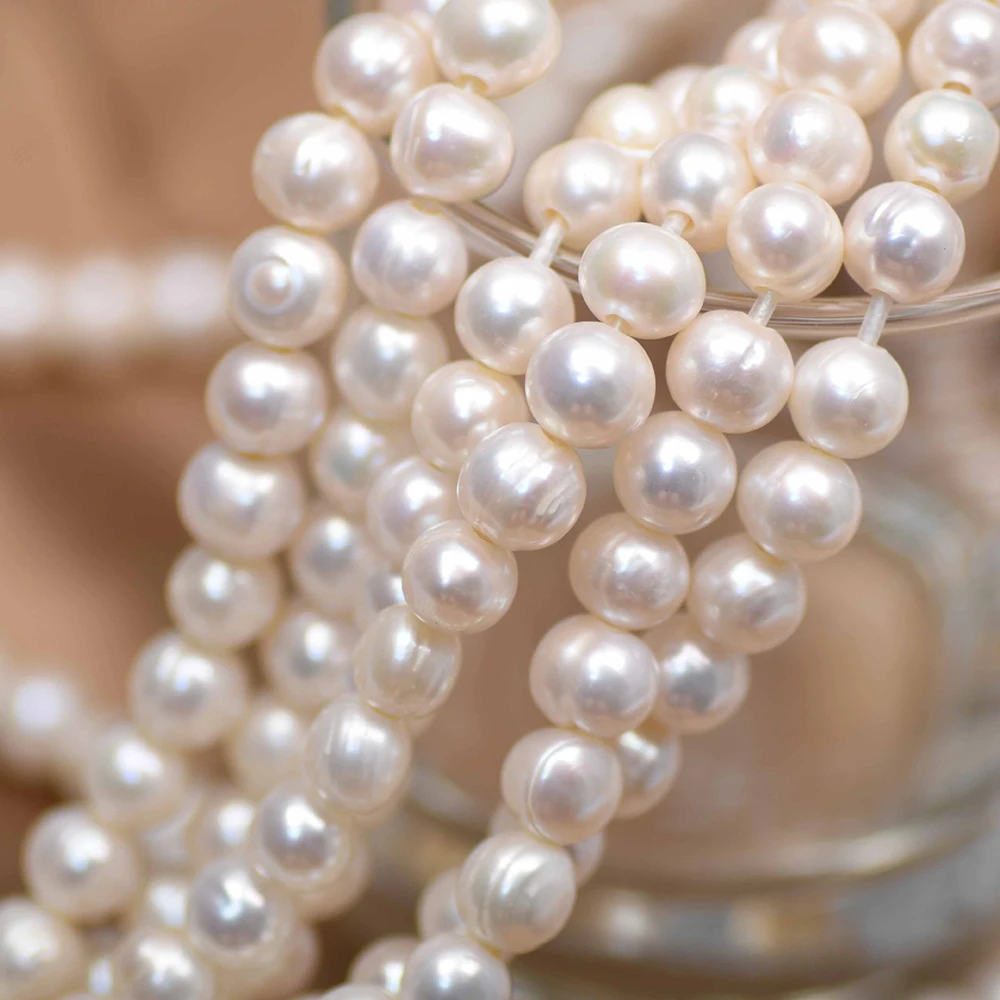 10-11mm 4A Large White Round F - đánh giá và giá Natural Freshwater Pearl Strand Loose Beads