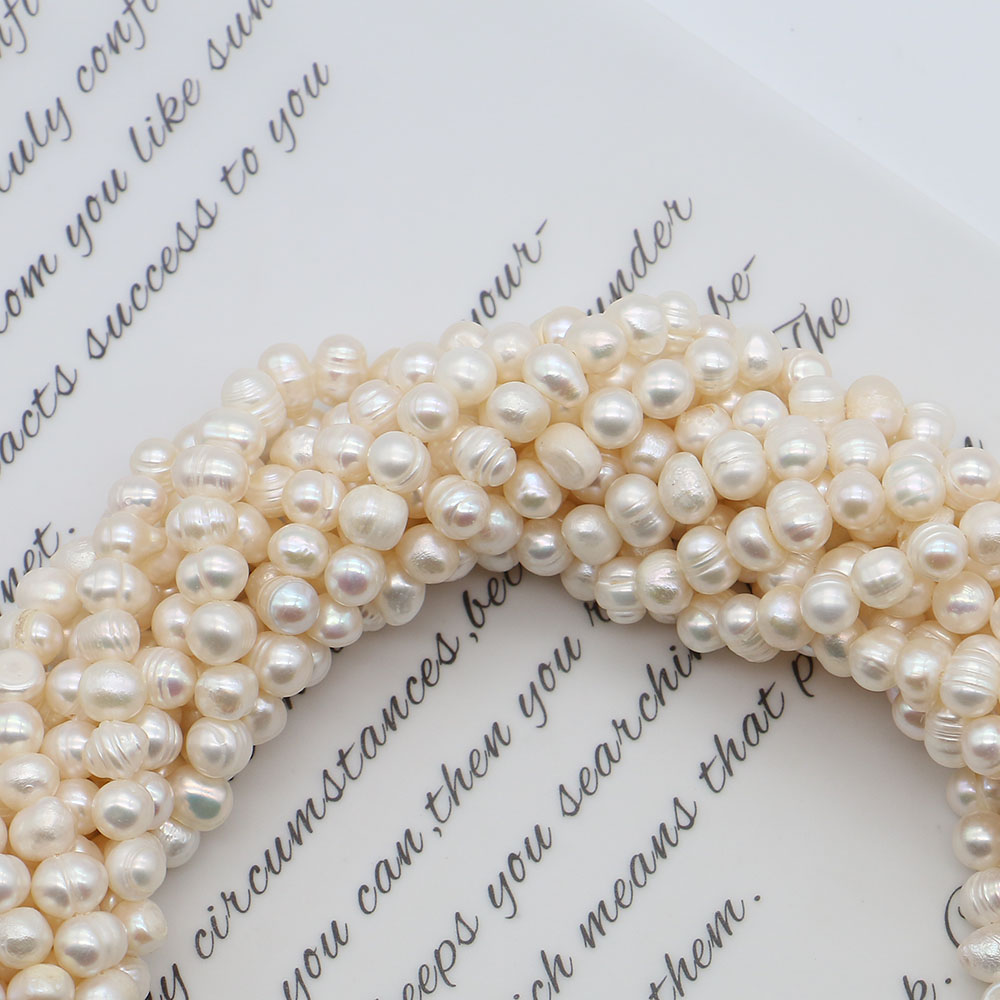White Round Natural Freshwater - đánh giá và giá Natural Freshwater Pearl Strand Loose Beads