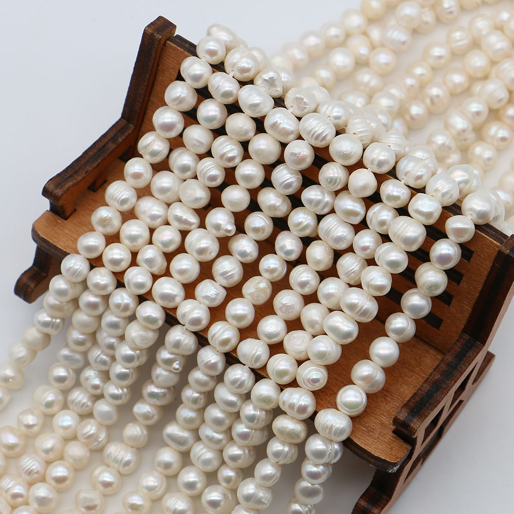 White Round Natural Freshwater - đánh giá và giá Natural Freshwater Pearl Strand Loose Beads