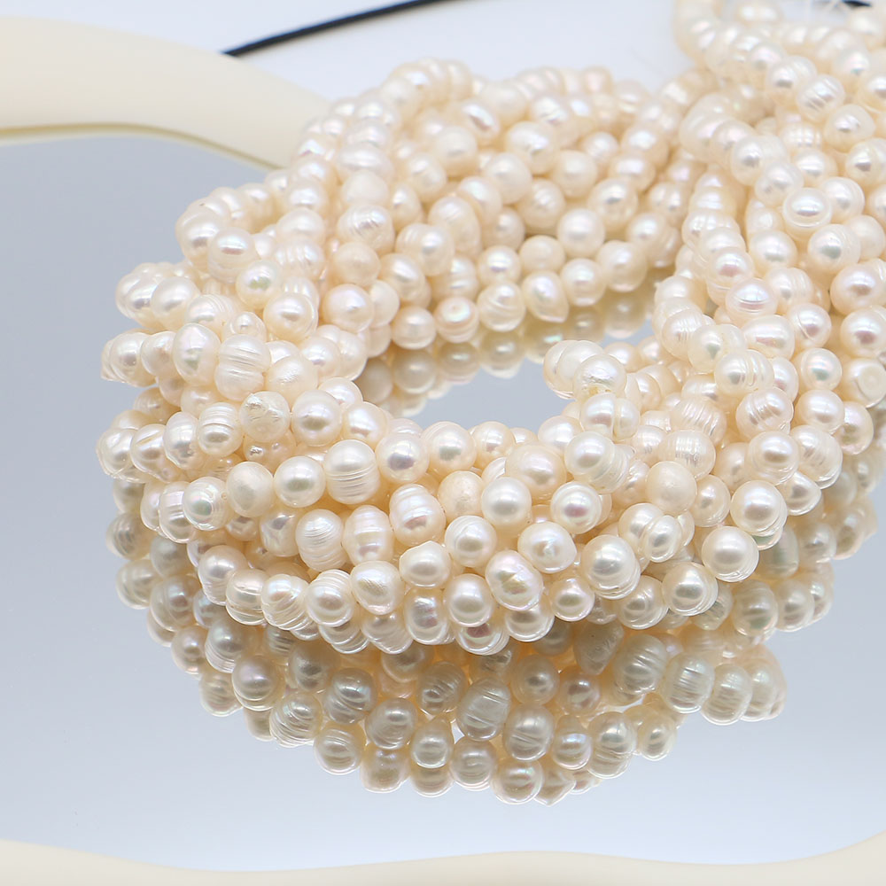 White Round Natural Freshwater - đánh giá và giá Natural Freshwater Pearl Strand Loose Beads